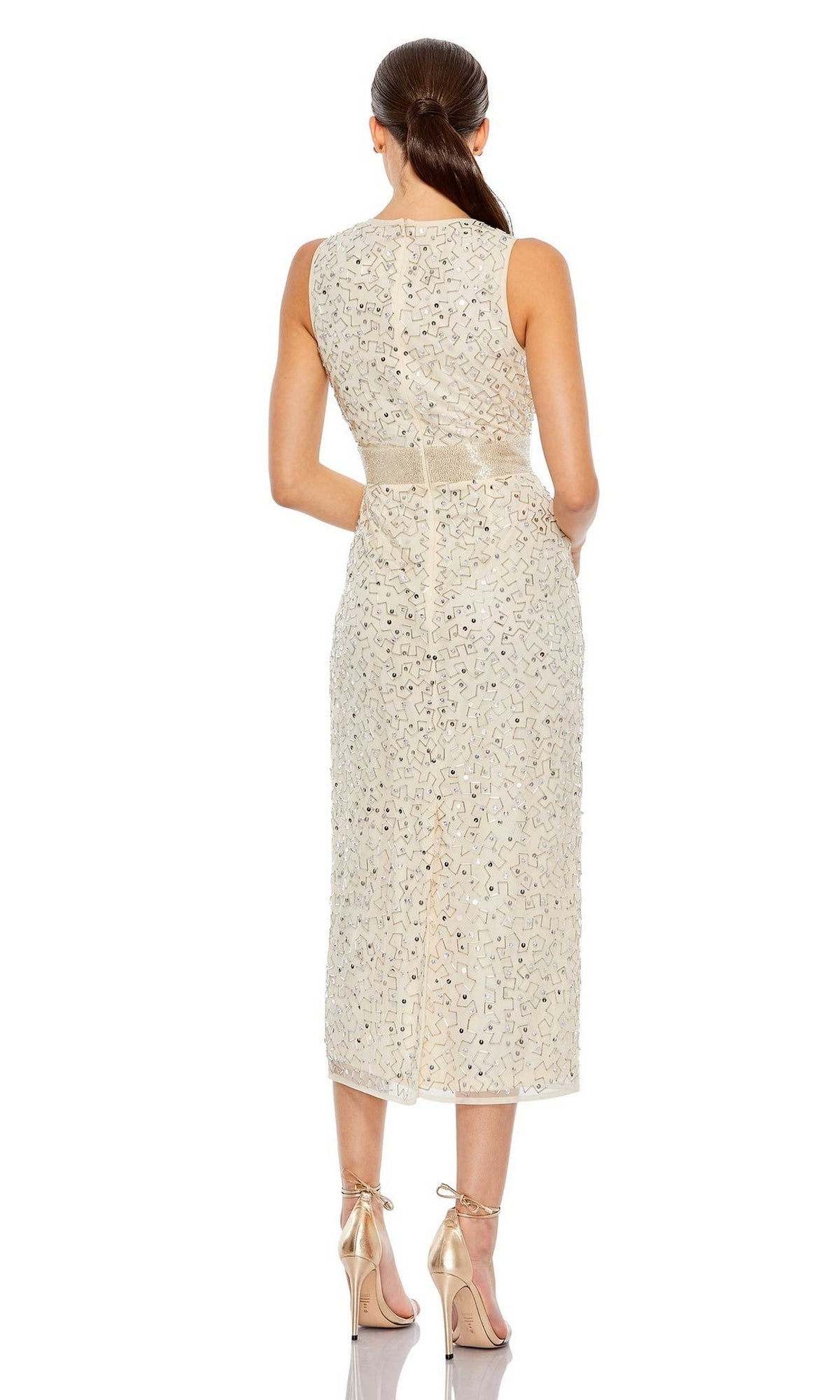 A woman faces away, wearing the sleeveless Mac Duggal 93758 Beaded Midi Wedding-Guest Dress with sequin details and gold high heels, set against a white background.